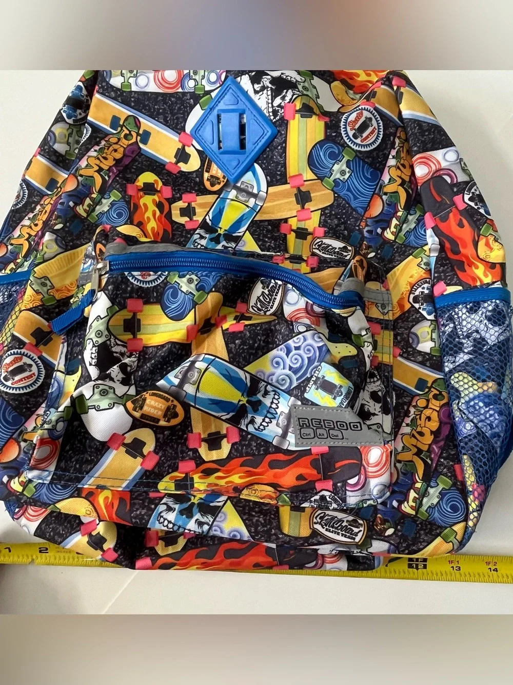 This Reboot Kids Blue Multi-Print Backpack - Fun Skateboard Pattern